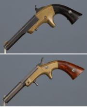Two Single Shot Pocket Pistols