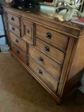9 drawer Wooden dresser. 42"x 62" x 19"