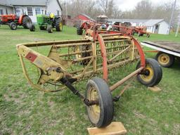 147. NEW HOLLAND 256 9 FT. PARALLEL BAR RAKE WITH HITCH WHEEL