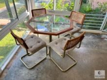 Octagonal 42 x 30 Glass-top Table with Four Chairs