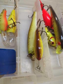 Tackle Box and contents including worms and various fishing lures of similar style. Comes as is