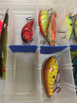 Tackle Box and contents including worms and various fishing lures of similar style. Comes as is