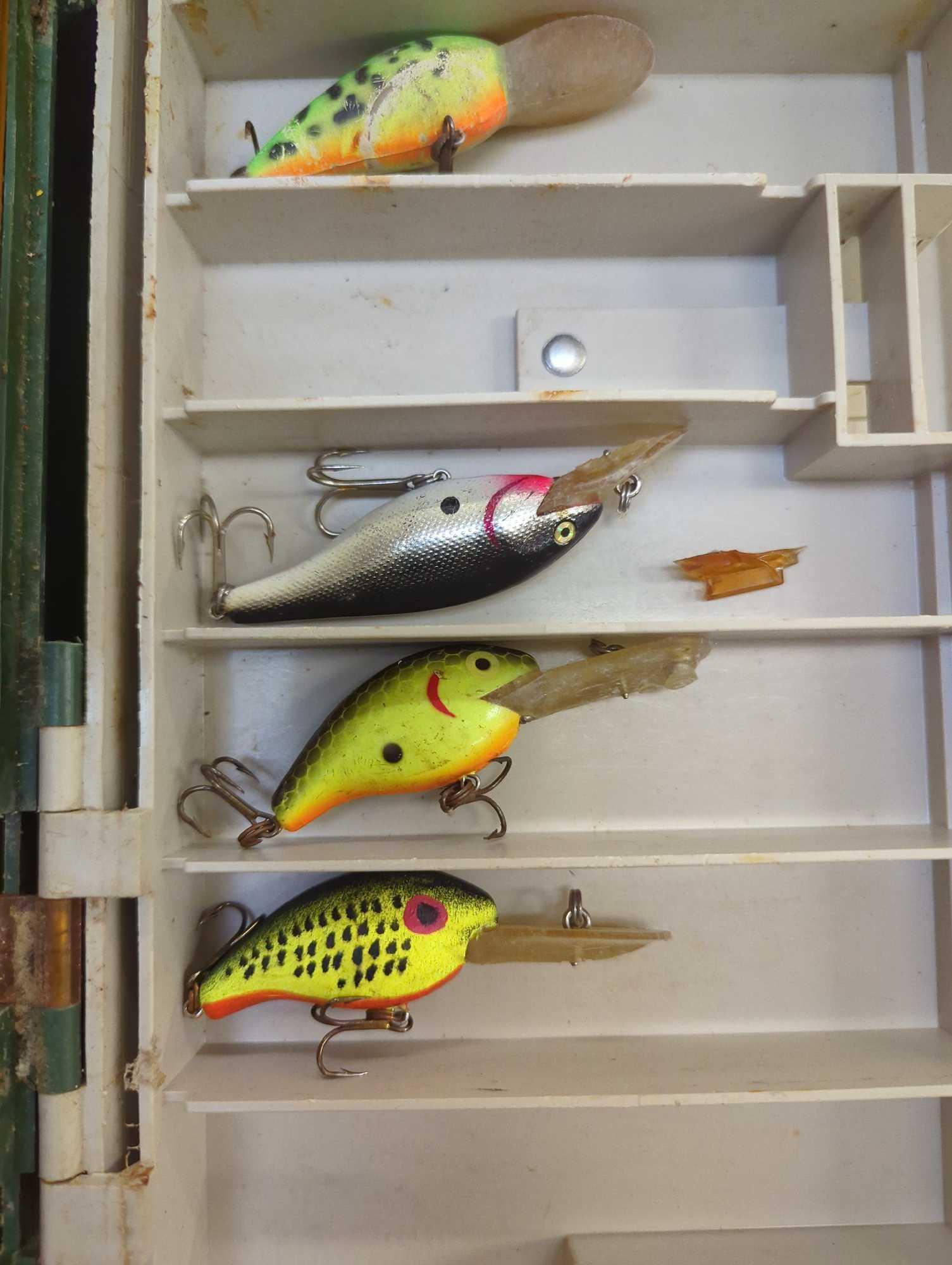 Large tackle box and contents including fishing worm lures and various fishing lures of similar