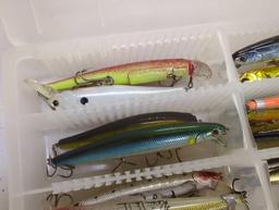 2 small tackle boxes containing fishing lures of similar style. Comes as is shown in photos. Appears