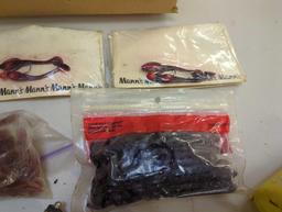 Box of fishing lures, rags, and other fishing gear. Comes as is shown in photos. Appears to be used.