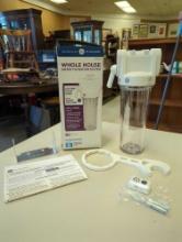 GE Whole House Water Filtration System. Comes an open box as is shown in photos. Appears to be new.
