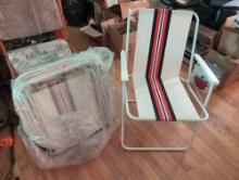 (LR) LOT OF (4) RETRO STYLE FOLDING BEACH CHAIRS. SLIGHTLY USED. THEY MEASURE 21-1/2"W X 19-1/2"D X