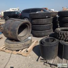 2 PALLETS. TRACKED VEHICLE PARTS, INCLUDING: RUBBER TRACK BELTING, NODWELL TIRE, 10.00-20, WITH WHEE