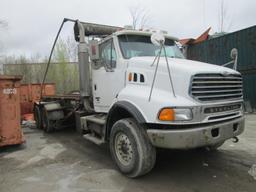 ROLLOFF TRUCK 2007 Sterling L-Line Tandem / axle Roll off truck SN 2FZHAZCV47AY63591, equipped with