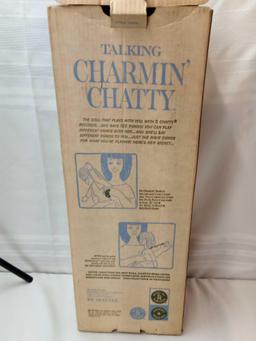 TALKING CHARMIN' CHATTY DOLL WITH CHANGEABLE RECORDS SHE DOES NOT WORK. 25"