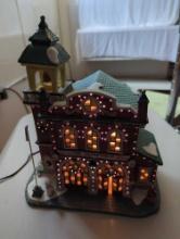 CHRISTMAS VILLAGE FIRE DEPARTMENT DOES LIGHT UP WORKS AND CHANGES COLORS . 10" AT STEEPLE . DOES