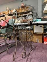 ornate twisted rod iron rocker and drop leg table