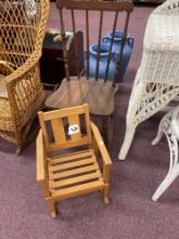 Antique rocker with no arms and a child?s slat chair