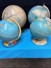 four world globes