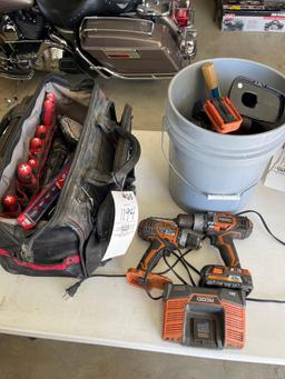 husky tool bag with handtools, rigid rechargeable power tools, bucket of tools