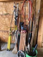 fishing poles, jumper cables, saw horse legs