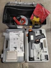 Cordless caulking gun, tool box and dog lead cable set