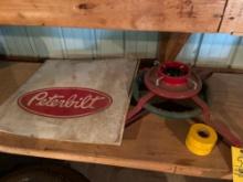 Peterbilt mud flaps and a Christmas tree stand