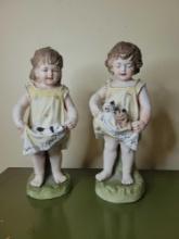 Pair of antique french porcelain child figures
