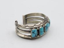 A Fine Sterling Silver and Turquoise Cuff Bracelet