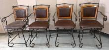 Four Brown Swivel Chairs