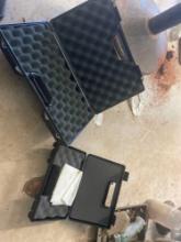 2 hard shell handgun cases