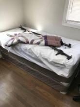 Twin bed with quilt -Laskey