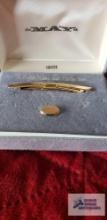 Gold colored collar holder and tie tack set