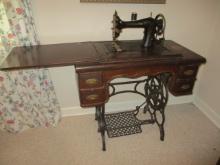 Vertical Feed Antique Sewing Machine in Cabinet
